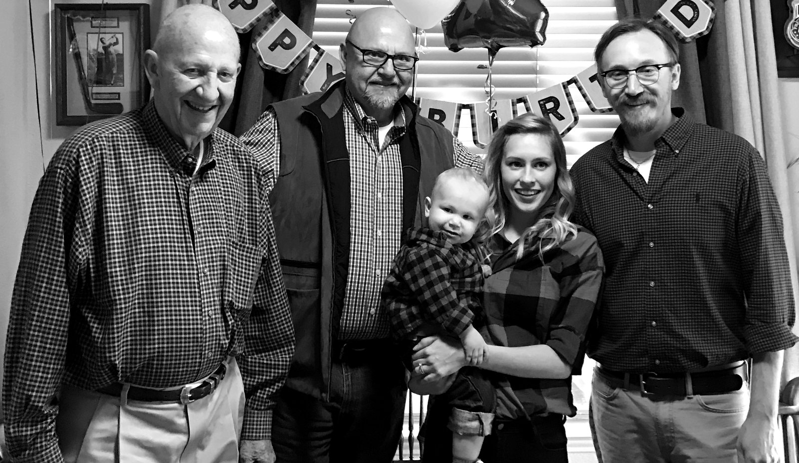 Four generations of the McCally family: Rick's father, Rick, his son, and his grandson.